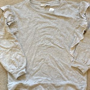 Loft grey ruffle sweatshirt. Never worn .